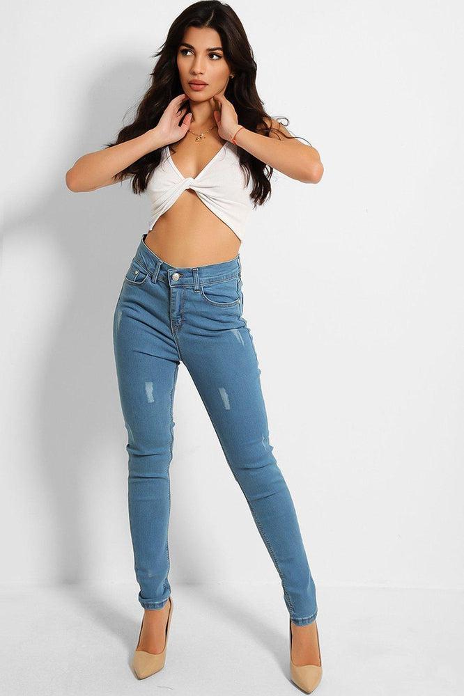 Distressed blue skinny sales jeans