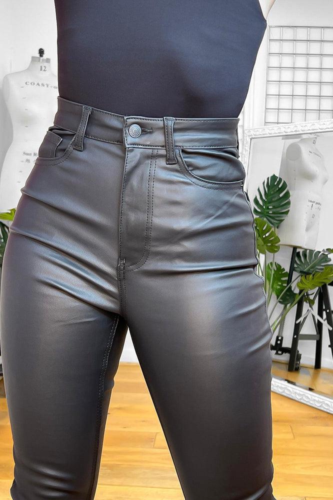 Leather on sale coated trousers